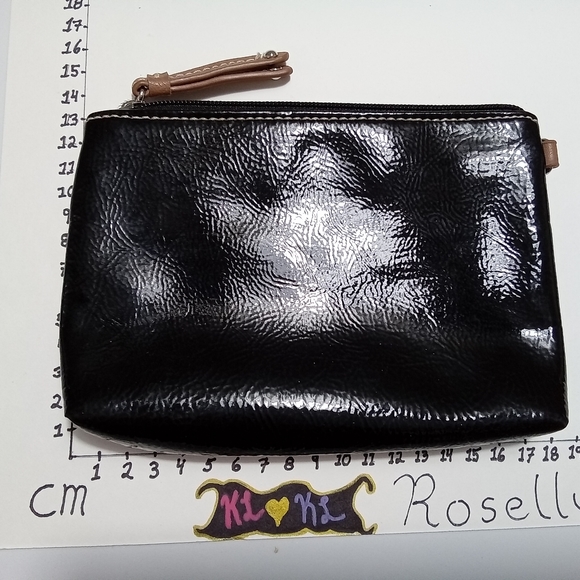 Small black clutch. No tags. Material unknown . Zipper in great condition. - Picture 1 of 3